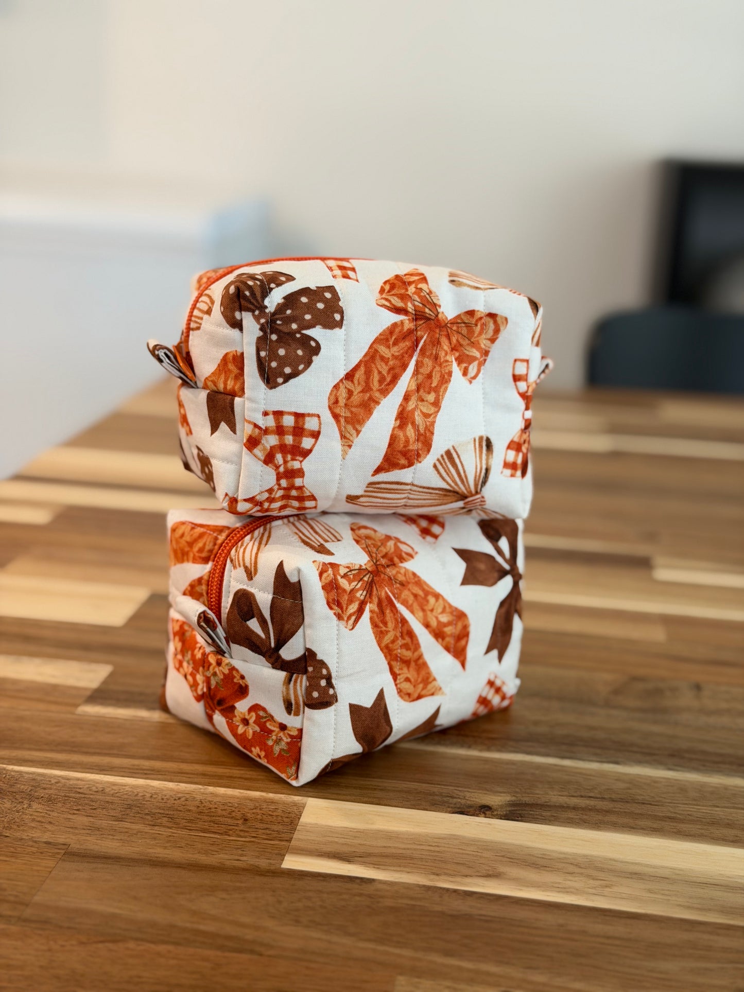 Handmade Quilted Cosmetic Bag – Orange Bow Print